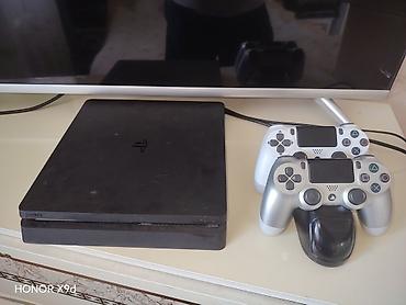 беспроводной: PlayStation 4 Slim + 2 геймпада DualShock 4 и зарядная док-станция — 1