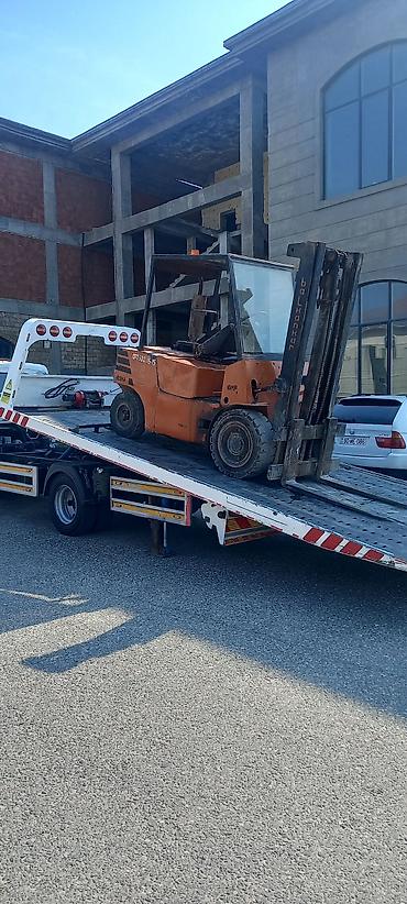 Yük daşımaları: Xidmət: Forkliftlə yüklərin daşınması və qaldırılması Sumqayıt — 2