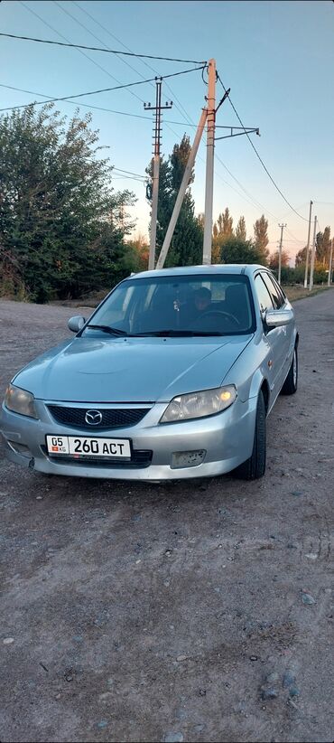 Mazda: Mazda 323: 2001 г., 2 л, Механика, Бензин, Хэтчбэк