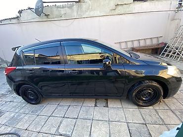 bmw e 39: Nissan Tiida, qara rəng, hetçbek gövdə. - Güclü və qənaətcil benzin — 4