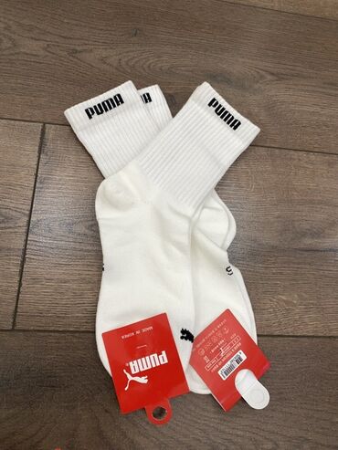 стоимость свадебного платья на прокат: Классические белые носки Puma с резинкой в рубчик. Изготовлены из