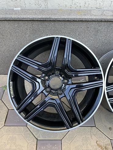 Диски: Комплект из 4 легкосплавных дисков AMG. - Диаметр: 20" (визуально — 5