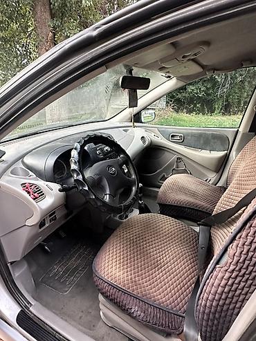 коробка нексия 1: Nissan Almera Tino: 2001 г., 1.8 л, Механика, Бензин, Хэтчбэк — 4