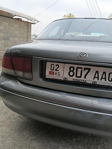 210 cdi: Mazda 626: 1992 г., Механика, Седан — 7