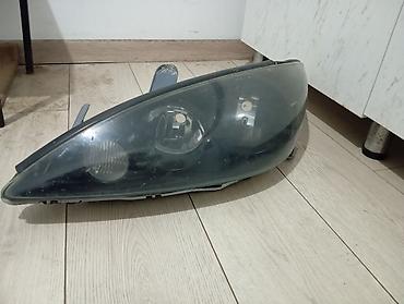 Передние фары: Передняя левая фара Toyota Оригинал — 2