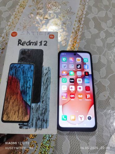 telefonlar ucuz: Xiaomi 12, 256 GB, rəng - Mavi, 
 Düyməli, Barmaq izi, İki sim kartlı