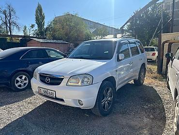 аренда mazda 323: Mazda Tribute: 2002 г., 2 л, Автомат, Бензин, Внедорожник — 2