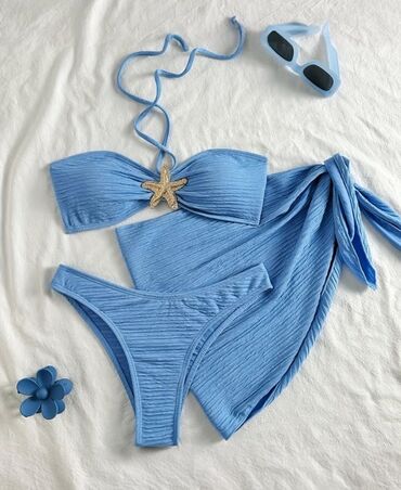 qadın yay geyimləri: Mavi rəngdə, dəniz ulduzu detallı bu bikini dəsti hovuz kənarında və