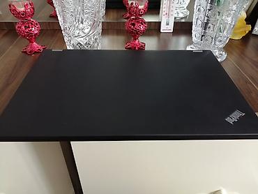 lenova thinkpad: Lenovo ThinkPad noutbuku (ThinkPad loqosu görünür). Geniş port seçimi — 7
