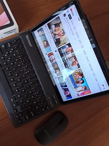 Xiaomi: Xiaomi Redmi Pad . Ustunde klaviatura və mause verilir, heç bi — 2