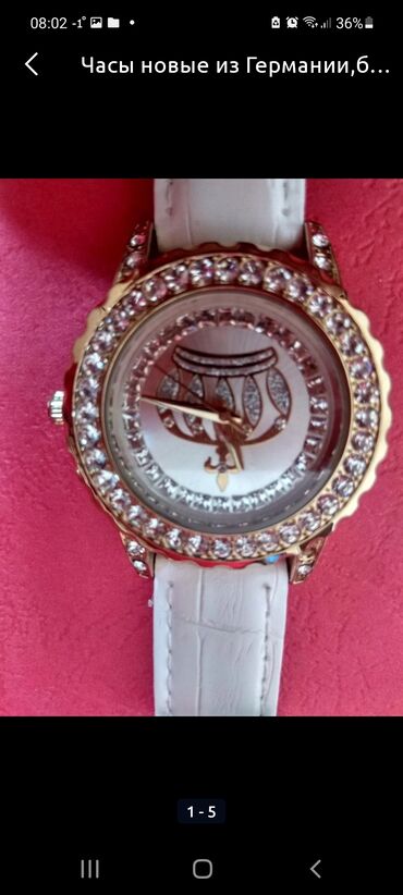 Женские новые часы из Германии со стразами,в живую очень красивые!