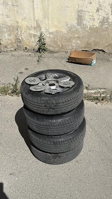 4 ədəd avtomobil təkəri və disk qapaqları dəsti. - Marka: Lassa (yan