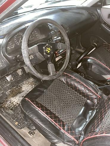 lexus is 2017: Mazda 323: 1993 г., 1.6 л, Механика, Бензин, Седан — 9