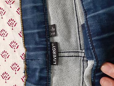 Брюки: Джоггеры с камуфляжным принтом и карманами карго, выполненные в — 10