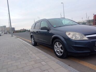 Opel: Opel Astra H – 5 qapılı hetçbek Xüsusiyyətlər: - Kuzov: tünd göy — 16