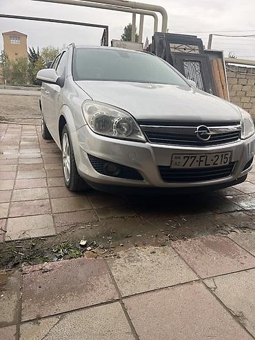 lada kalina 2008: Opel Astra Caravan (universall) – gümüşü rəng Xüsusiyyətlər: - Kuzov — 10