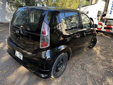 ун басандаткыч: Daihatsu : 2010 г., 1 л, Кол менен иштөөчү, Бензин, Хетчбек — 5