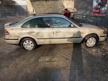 электирик машина: Mazda 626: 1999 г., 2 л, Автомат, Бензин, Хэтчбэк