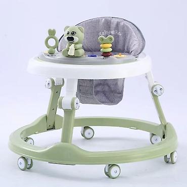 Детские ходунки с игровой панелью . - Круглая устойчивая база с 8