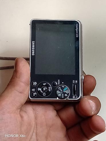 canon eos 2000d: Samsung rəqəmsal fotoaparat - 10.2 megapiksel həlli - Samsung Lens — 2