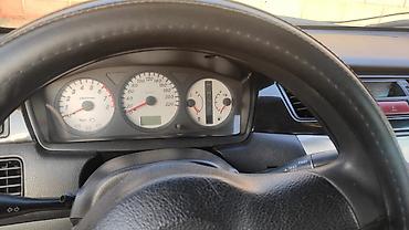 рул: Mitsubishi Lancer: 2006 г., 1.6 л, Автомат, Бензин, Седан — 8