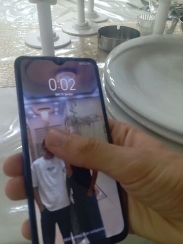 Аудиотехника: Redmi 8A Pro, 128 ГБ, цвет - Синий, Сенсорный