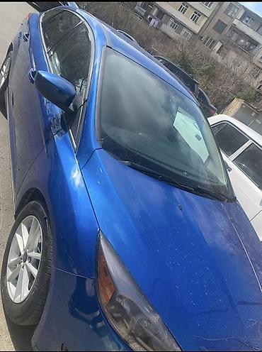 Avtomobil satışı: Ford Focus sedan – mavi rəng, 4 qapı, 5 yerlik. Texniki və avadanlıq — 1