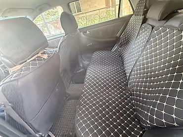 тойота королла е120: Toyota Corolla: 2002 г., Хэтчбэк — 8