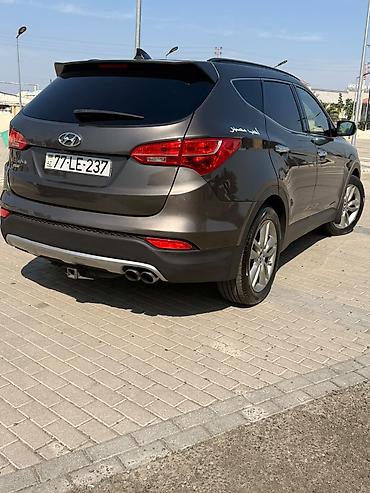 niva pikap satilir: Hyundai Santa Fe krossover modeli təqdim olunur. Avtomobil tünd boz — 2