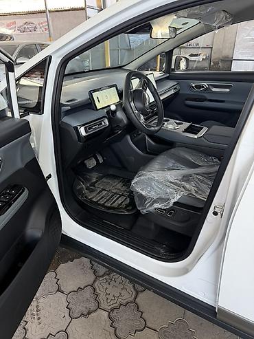 GAC: Электромобиль GAC Aion Y (белый), компактный кроссовер/минивэн с — 7