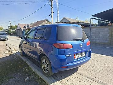 low ll: Mazda Demio: 2003 г., Автомат — 4