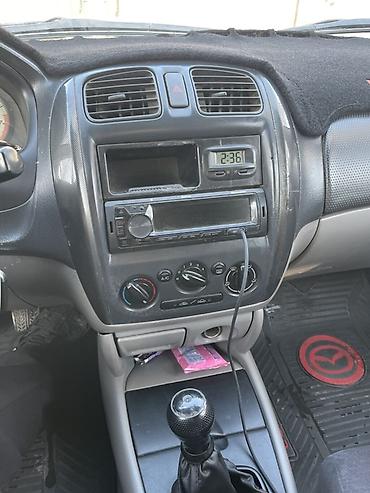 Mazda: Mazda 323: 2003 г., 1.6 л, Бензин, Универсал — 18