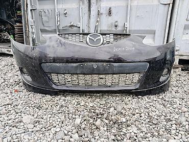Передний бампер Mazda Demio (написано “Demio 2008/2009” на детали;