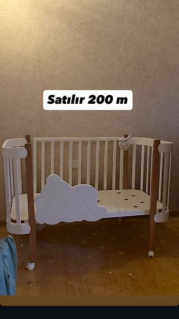 ayı dərisi: Uşaq beşiyi – 200 m - Material: ağ və taxta rəngli kombinasiyalı — 1