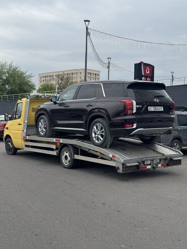 оор жук ташуучу унаалар: Көтөргүсү менен, Гидроманипулятору менен, Кыймылдуу платформасы менен