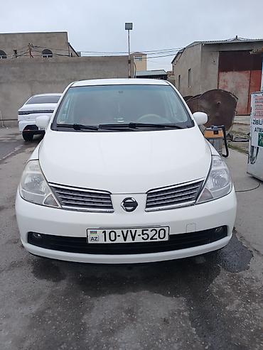 4 ayaq: Nissan Tiida: 1.6 l | 2006 il Sedan — 8