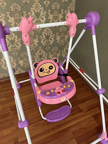 Игровые комплексы: Детские напольные качели с сиденьем-переноской - Тип: напольные — 2