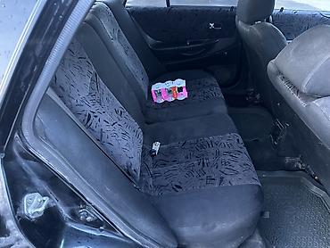 Mazda: Mazda 323: 2000 г., 1.8 л, Механика, Бензин, Универсал — 10