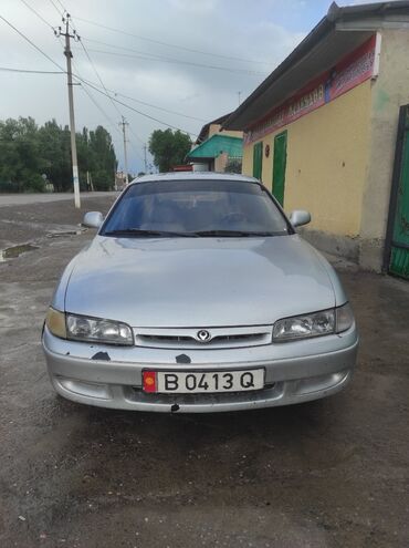 уборочная машина: Mazda Cronos: 1997 г., 1.8 л, Механика, Бензин, Хетчбек