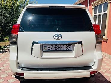 фольксваген поло л с: Toyota Land Cruiser Prado, ağ rəng, 5 qapı, tam ölçülü SUV — 3