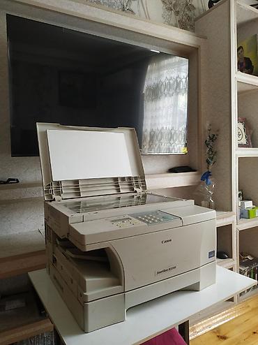 tercume aparati: Şəkildə gördüyünüz Canon SmartBase PC1210D modelidir. Bu — 3