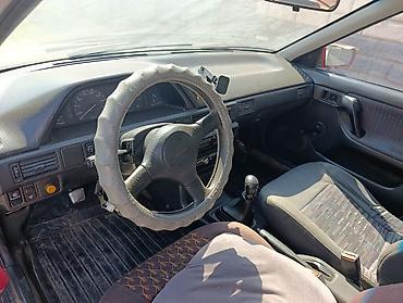 Mazda: Mazda Familia: 1992 г., 1.6 л, Кол менен иштөөчү, Бензин, Седан — 3