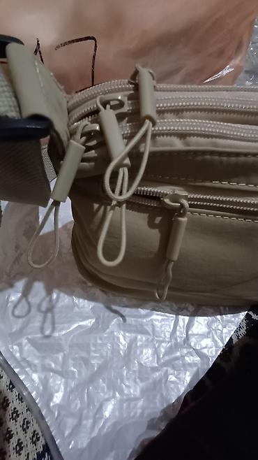 Классические сумки: Продаётся женская сумочка с длинным ремнём,материал плащёвка мягкая at lalafo.kg — 8 Классические сумки: Продаётся женская сумочка с длинным ремнём,материал плащёвка мягкая — 8