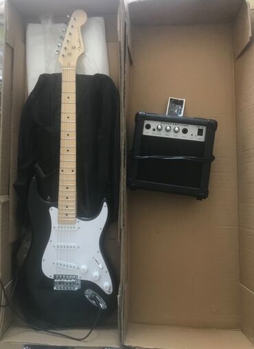 mikrofon kalonka: Gitara satılır. Yenidir. 1-2 defe işlenib. Kolonkası, çexolu var