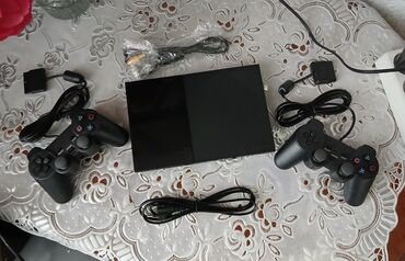 1 ar ne qederdir: #Playstation 2 Super slim əla vəziyətdə iki təzə pult hazır qoş oyna