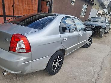 range over: Kia Spectra: 2002 г., Механика, Бензин, Седан — 4