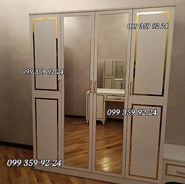Dolablar: Ağ rəngli, klassik üslubda 5 qapılı paltar şkafı. Orta hissədə 2 ədəd — 1