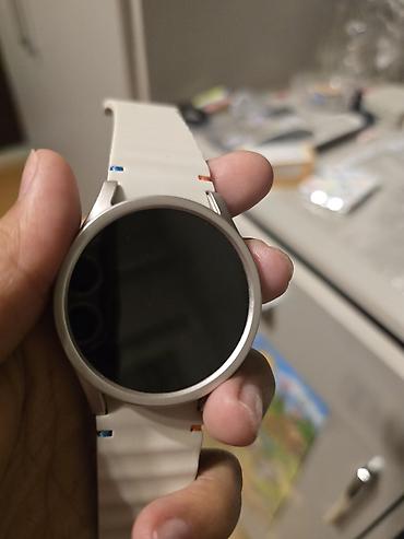 galaxy tab e: Samsung Galaxy Watch7 (модель SM-L300), цвет Cream. Основные — 2