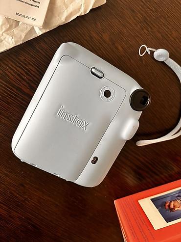 мереке видео: Fujifilm Instax mini 12 — мгновенная камера в цвете Pastel Blue — 6