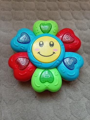tomos za decu: Interaktivna muzička igračka – cvet sa nasmejanim suncem - Šarena — 1
